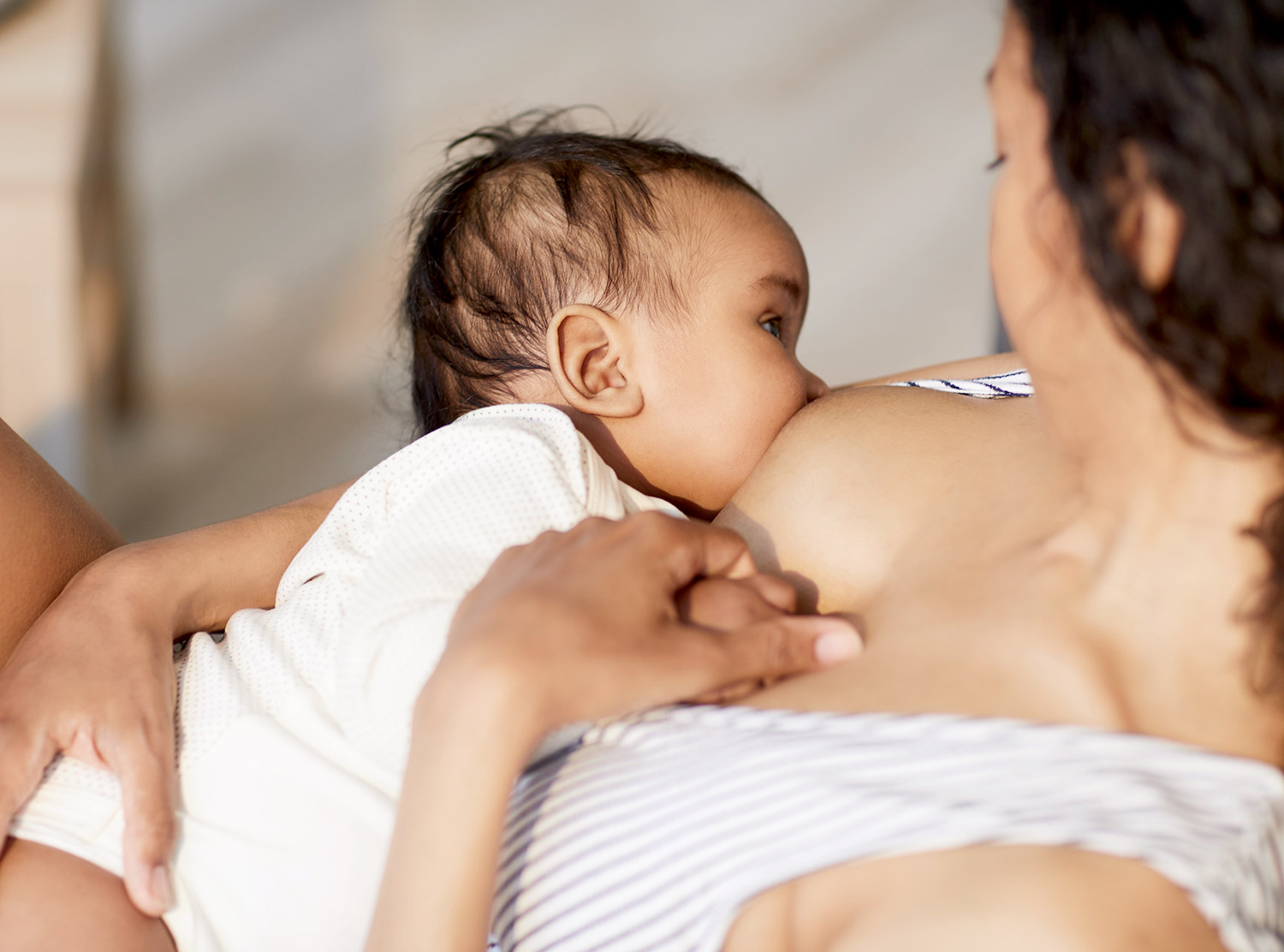Mother breastfeeding her baby